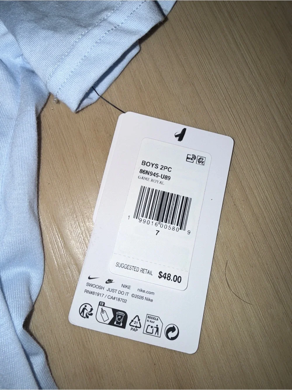 Nike Light Blue Kids Tee with White Swoosh and Wordmark